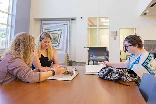 Students studying in Belk Library